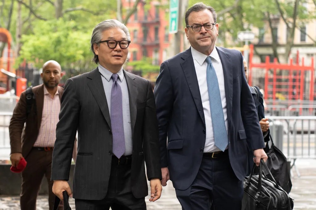 Bill Hwang, Chief Executive Officer and founder of Archegos Capital Management, left, accompanied by attorney Barry Berke, arrives at federal court in New York, US. 

Image Source: New York Post 